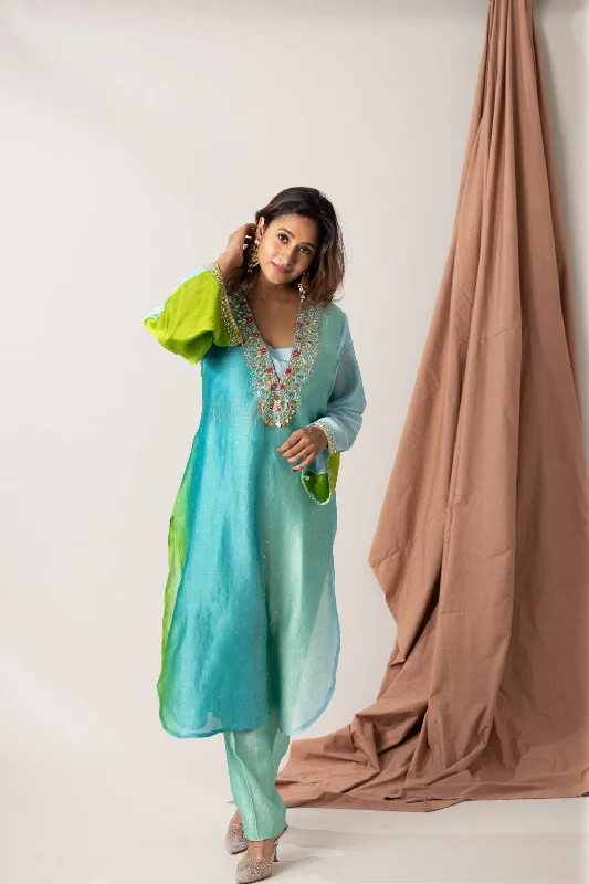 Falling Raw Silk Mukaish Fabric With Hand Embroidered Neck And Sleeves, Includes A Pant Soft Sweatpants Style